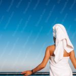 White Towel Figure Blue Sky Background Image & Google Slides Theme