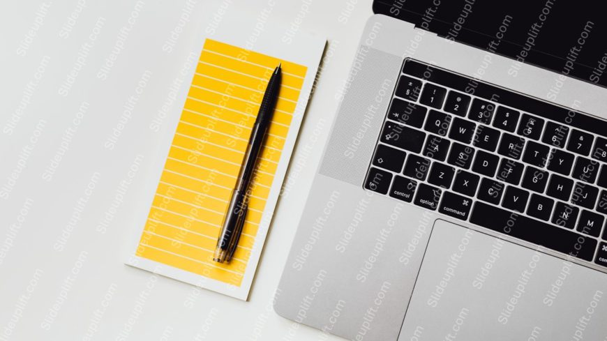 Yellow Lined Notepad Black Pen Silver Laptop Background Image